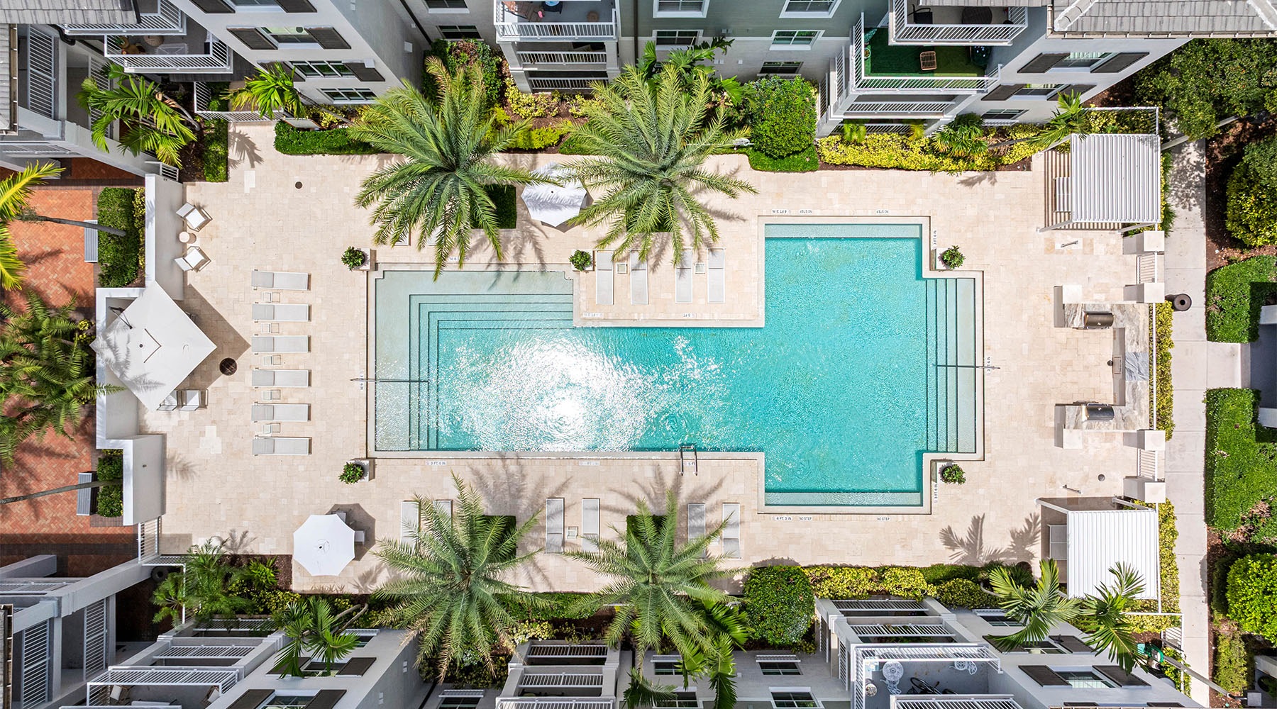 a pool in a courtyard a pool in a courtyard